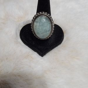 Beautiful green stone ring with a big presence.  Set in beaded sterling.  Size 7